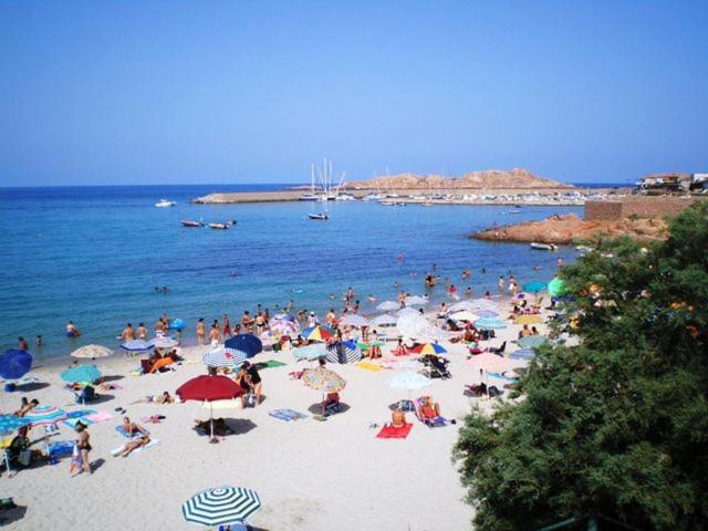 Tanca Della Torre Trilocale Vista Mare Apartment Isola Rossa Luaran gambar